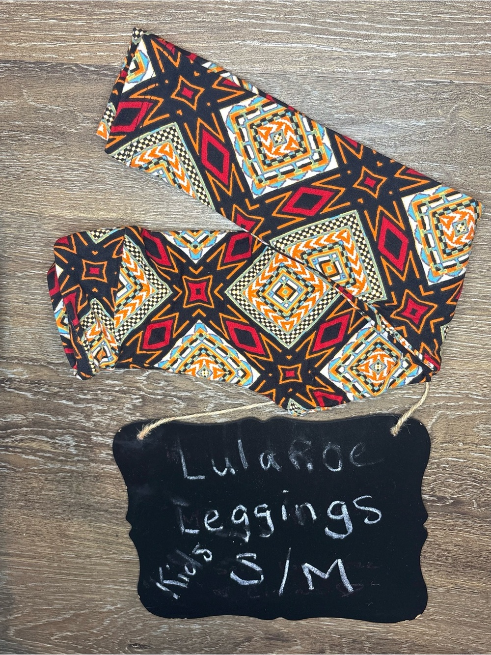 LuLaRoe Kids Geometric Starburst Leggings - Black/Orange/Red
